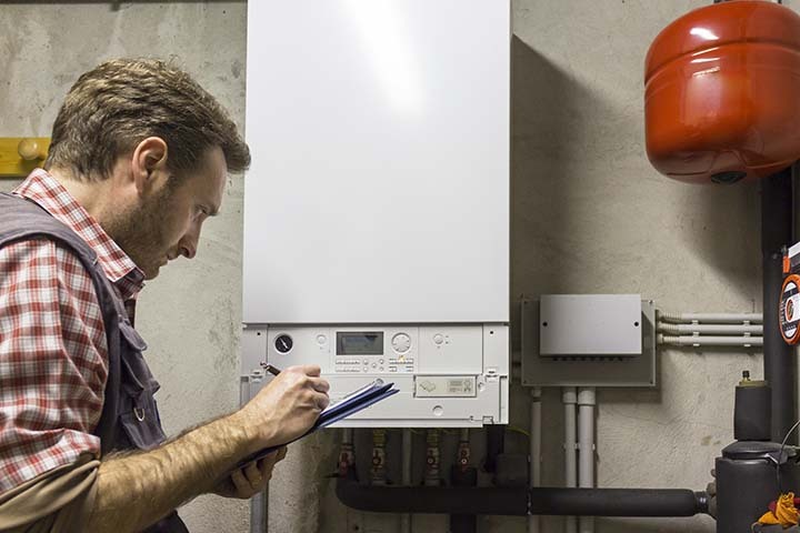 Modern condensing boiler installed in a UK home, highlighting energy efficiency and compact design