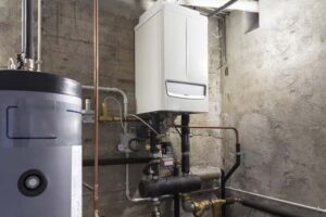 Modern condensing boiler installed on a kitchen wall without a water tank