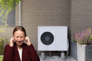 Air source heat pump installed outside a home showing how quiet modern systems can run